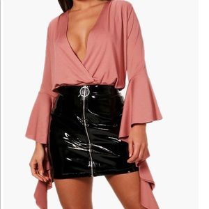 Never worn still has tag on it. Could not fit it.